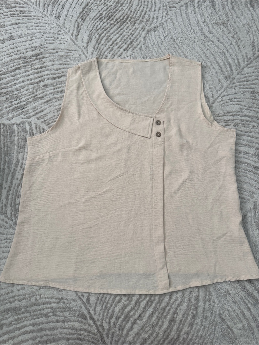 Light Cream Sleeveless Button Accent Top